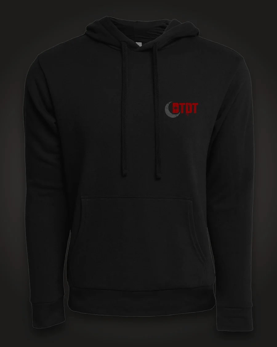 Mockup, front: black hoodie with the DTDT crescent mark in grey and dripping red on the left chest.