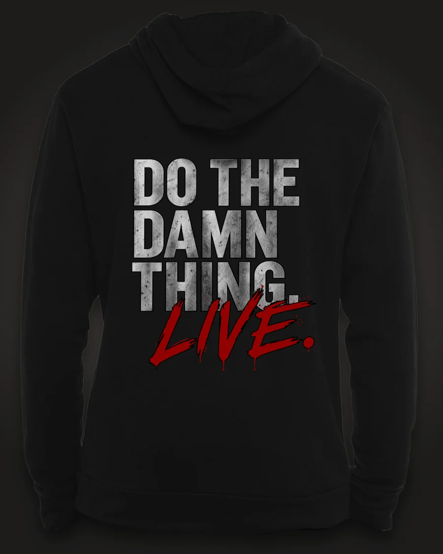 Mockup, back: black hoodie with “Do the damn thing.” in brushed-silver letters with “Live.” brushed across it in red.