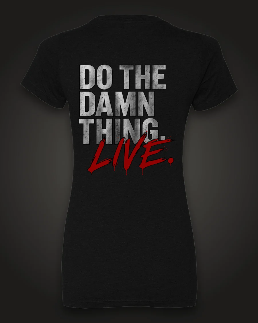 Mockup, back: black women’s tee with “Do the damn thing.” in brushed-silver letters with “Live.” brushed across it in red.